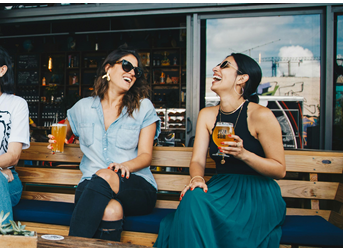Friends catching up over a drink